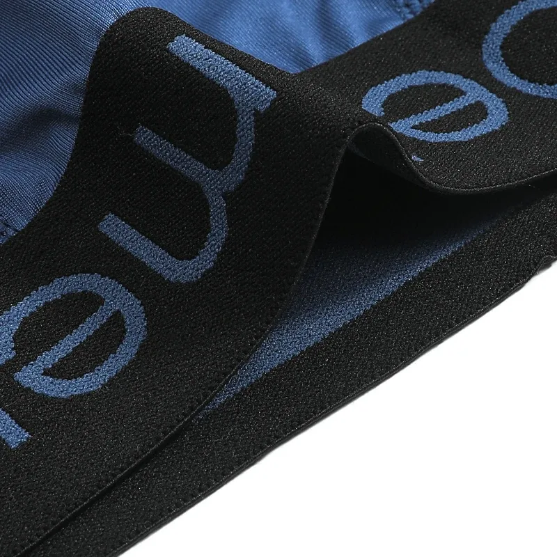 Men's underwear triangle shorts ice silk fashion breathable sexy thin U convex bottom pants youth low waist triangle shorts head