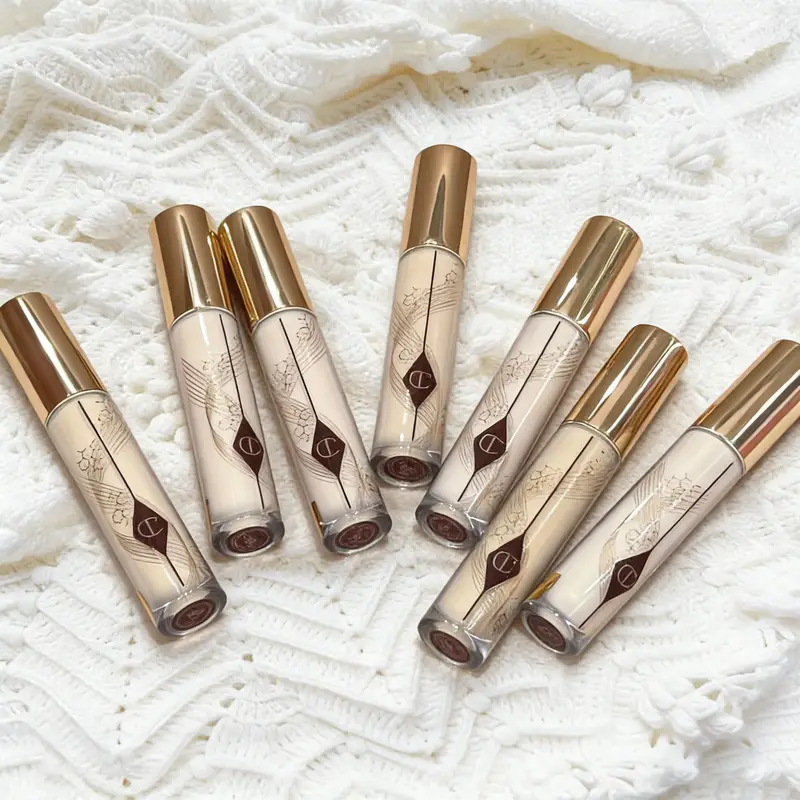 Charlotte Tilbury Softening Essence Concealer Honey Brightening in The Face Covering Spots Covering Dark Circles Under The Eyes — image 2