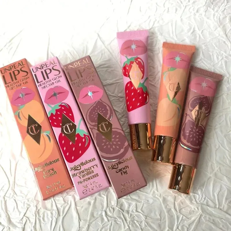 Charlotte Tilbury Lip Gloss Moisturizing Hydrating Silky Exfoliating Long-lasting Concealing Everyday Cosmetics With Packaging — image 1