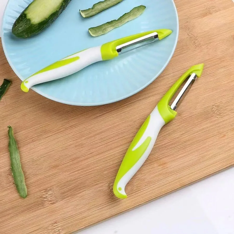 Vegetable and fruit peeler suitable for kitchen fruit vegetable and potato peeler ergonomic non-slip handle and sharp blade. — image 1