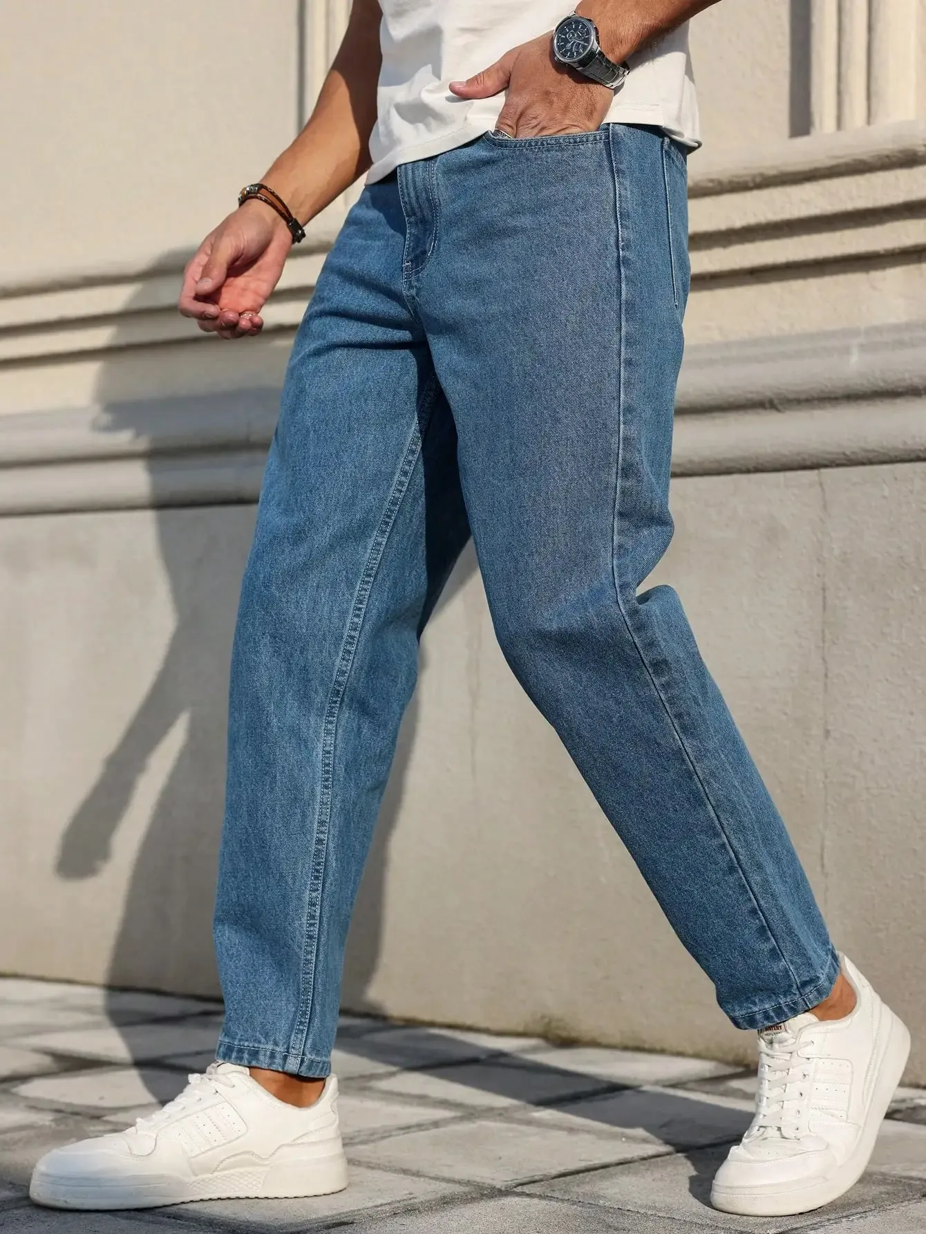 Men's Jeans Are Made of Classic Blue Denim Fabric with a Loose Fit Making Them an Indispensable Versatile Item in the Wardrobe. — image 4