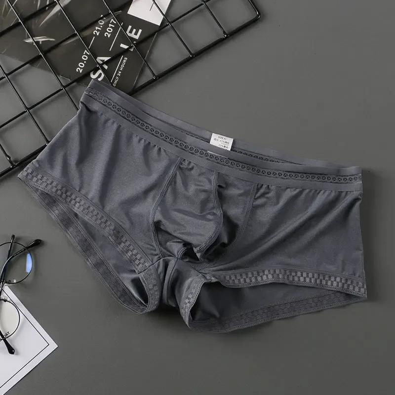 熱い販売アイスシルク男性下着シームレス透明ボクサーパンツ超薄型通気性快適なパンティーパンツ